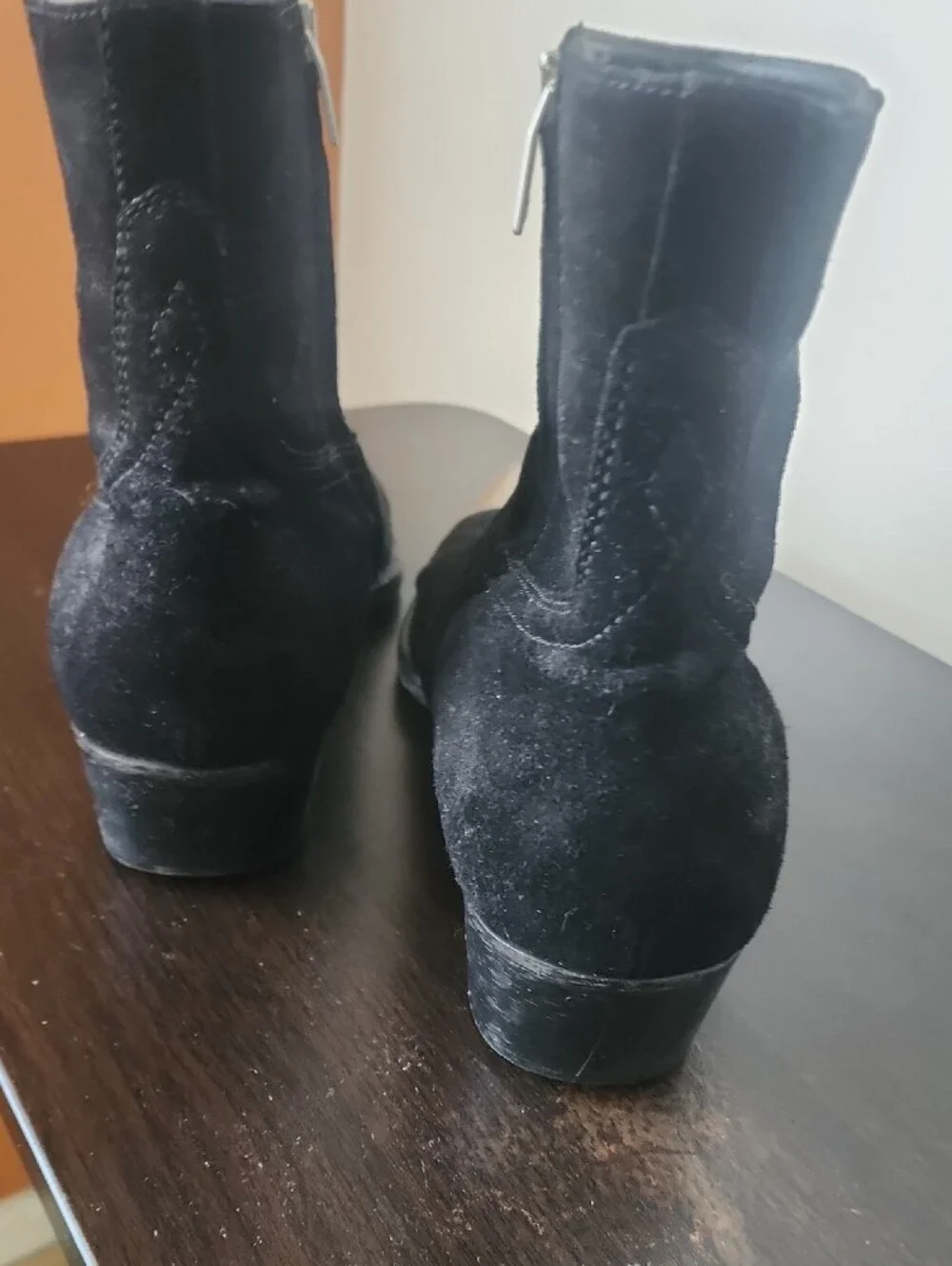 Represent black suede